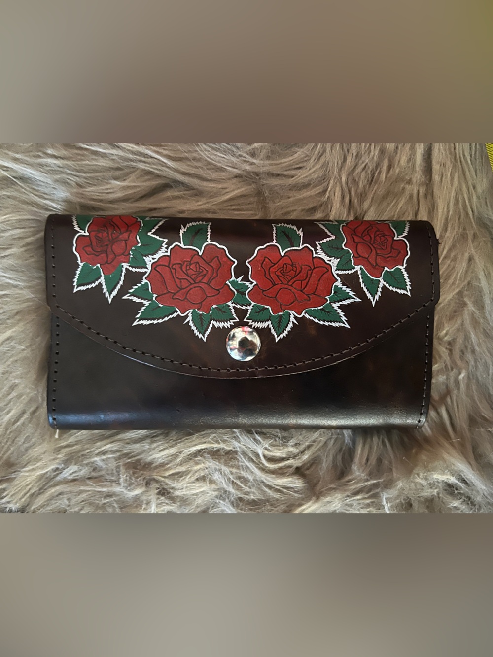 Hand-Painted Red Rose Wallet bought from
Boutique while traveling